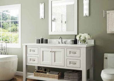 white bathroom vanity with drawers and shelf