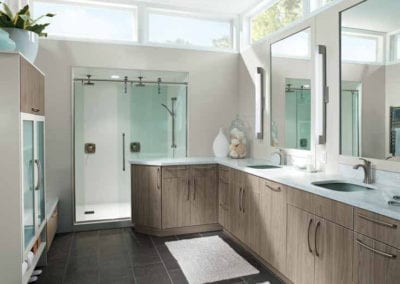 spacious bathroom with natural brown cabinets