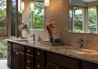classic bathroom cabinets with brown stain and two sinks