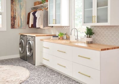 white built-in cabinets in laundry room