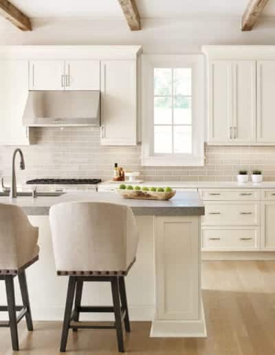 clean white kitchen with light hardwood floors