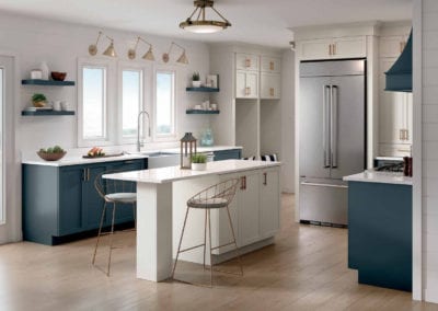custom kitchen with blue cabinets and white island
