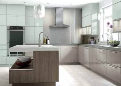 modern kitchen with glass cabinet fronts and island with storage