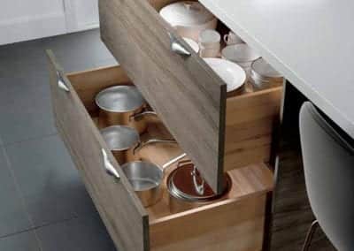 pots and pans organized in kitchen drawers