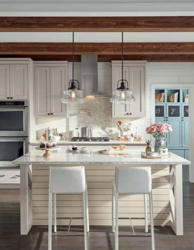 kitchen with white kitchen cabinets and island